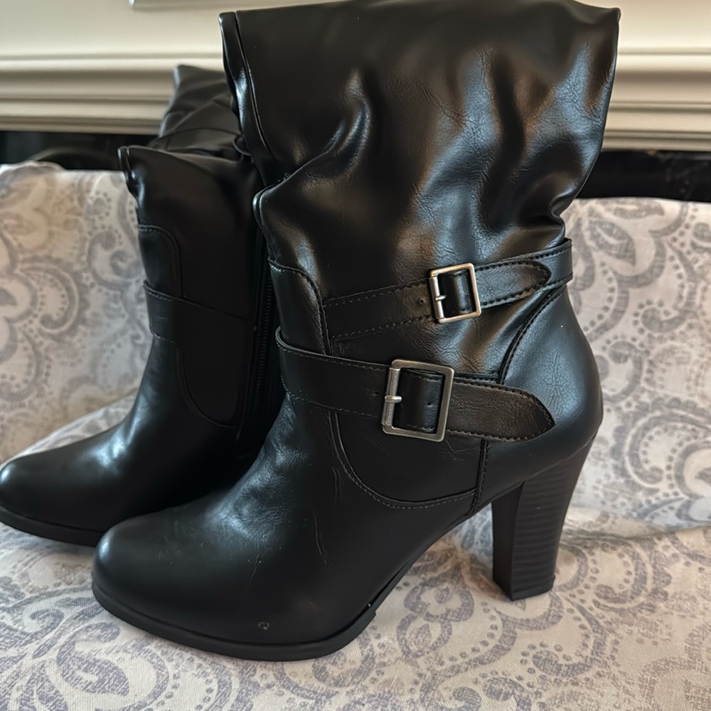 Black 3 inch heels with two buckles on the side with box